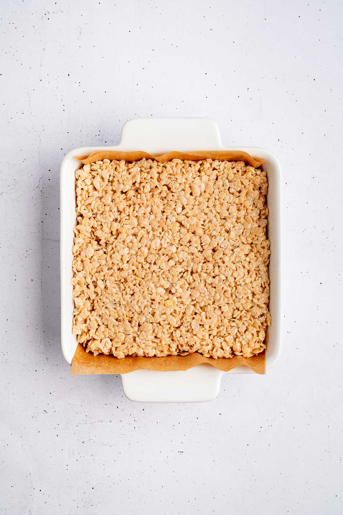 Rice Krispie treats pressed into an 8x8 dish