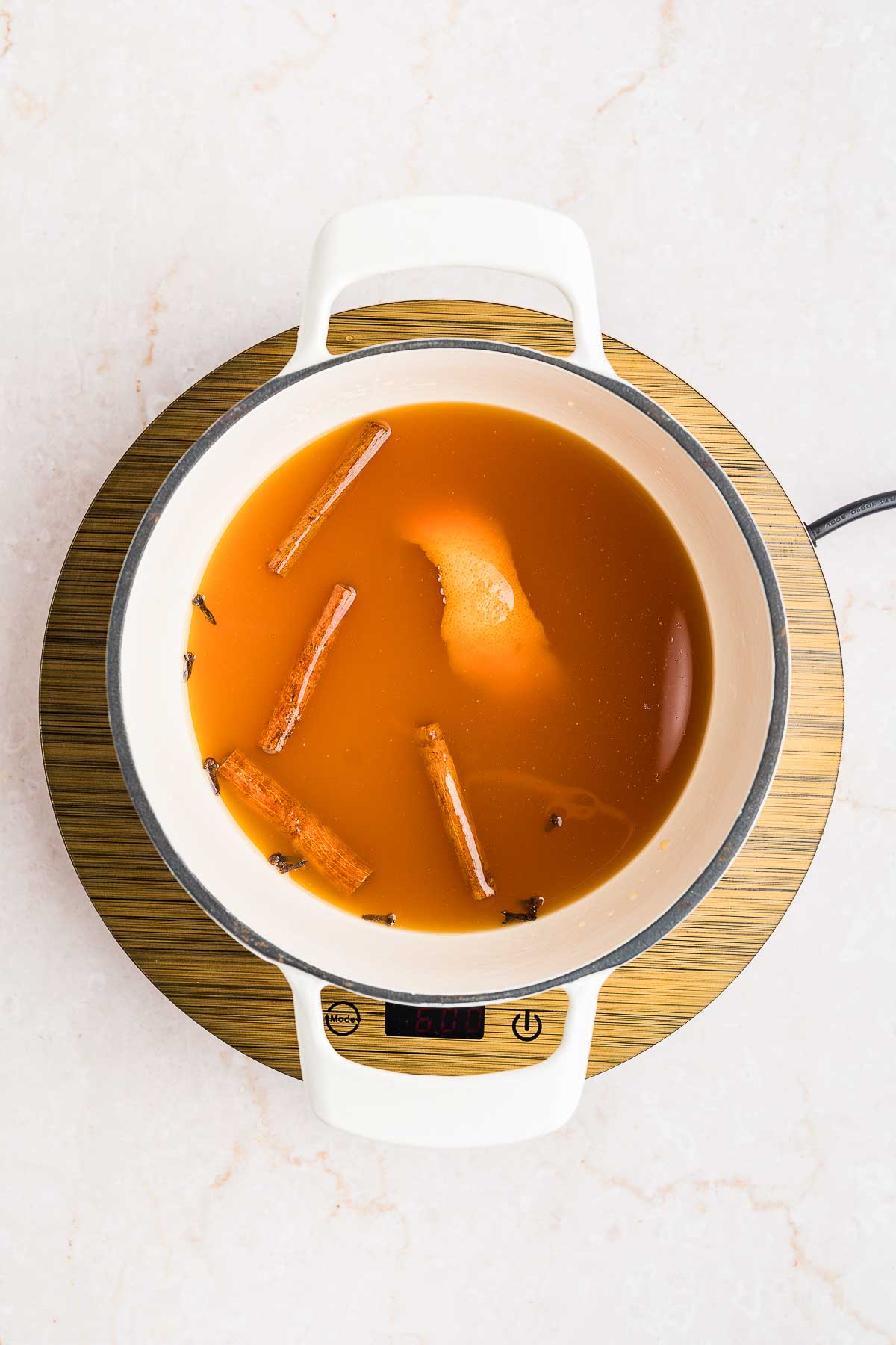 simmering ingredients for apple cider punch